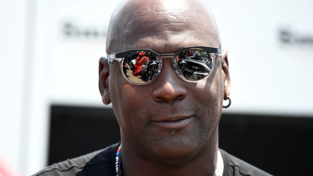 Team 23XI owner Michael Jordan looks on from pit road during qualifying before the Ally 400 at Nashville Superspeedway.